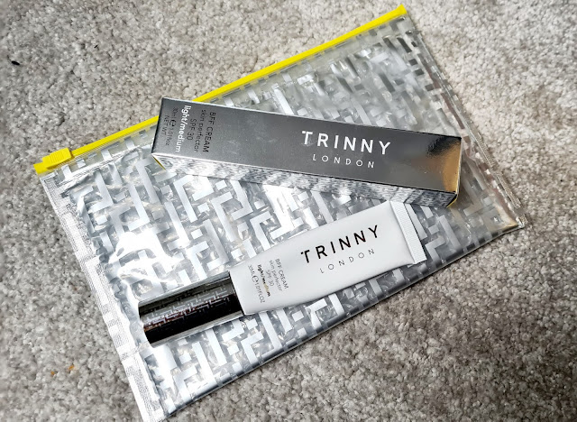 A shiny metallic tube of Trinny London BFF Cream SPF 30